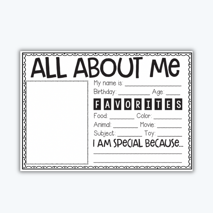 Black-and-white All About Me poster with prompts for students to fill in personal information, leaning against a classroom desk.