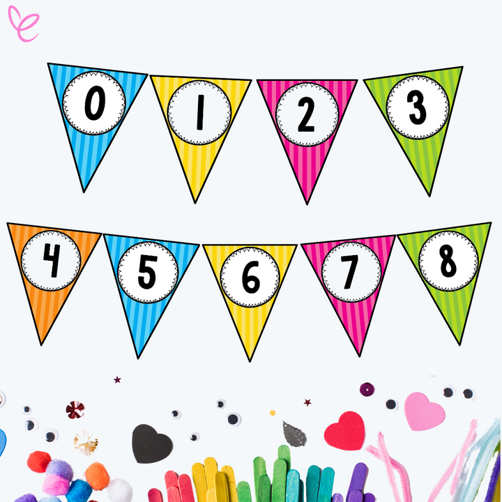 A colourful number bunting display featuring triangular flags in blue, yellow, pink, green, and orange, each containing a number from 0 to 8 in bold black text. The display is set against a white background with scattered craft materials like googly eyes, popsicle sticks, and heart-shaped cutouts.