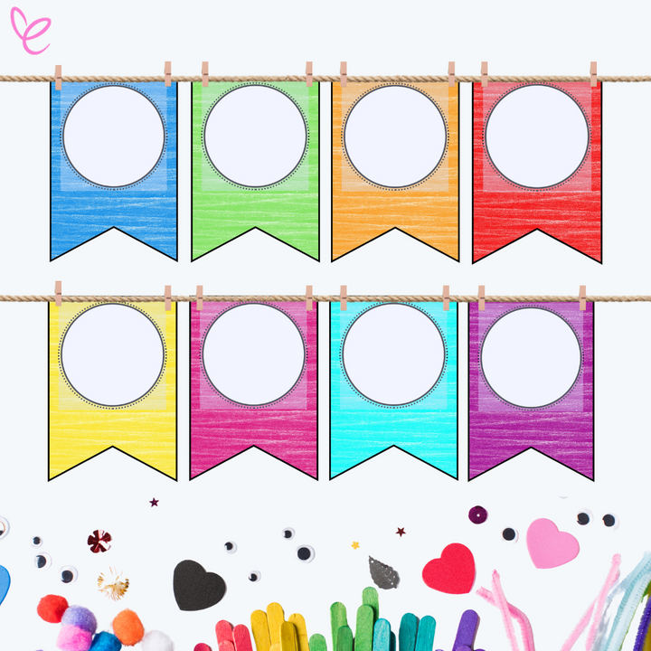 A colourful classroom banner displayed on a rope with eight chalk-textured flags in blue, green, orange, red, yellow, pink, purple, and teal.