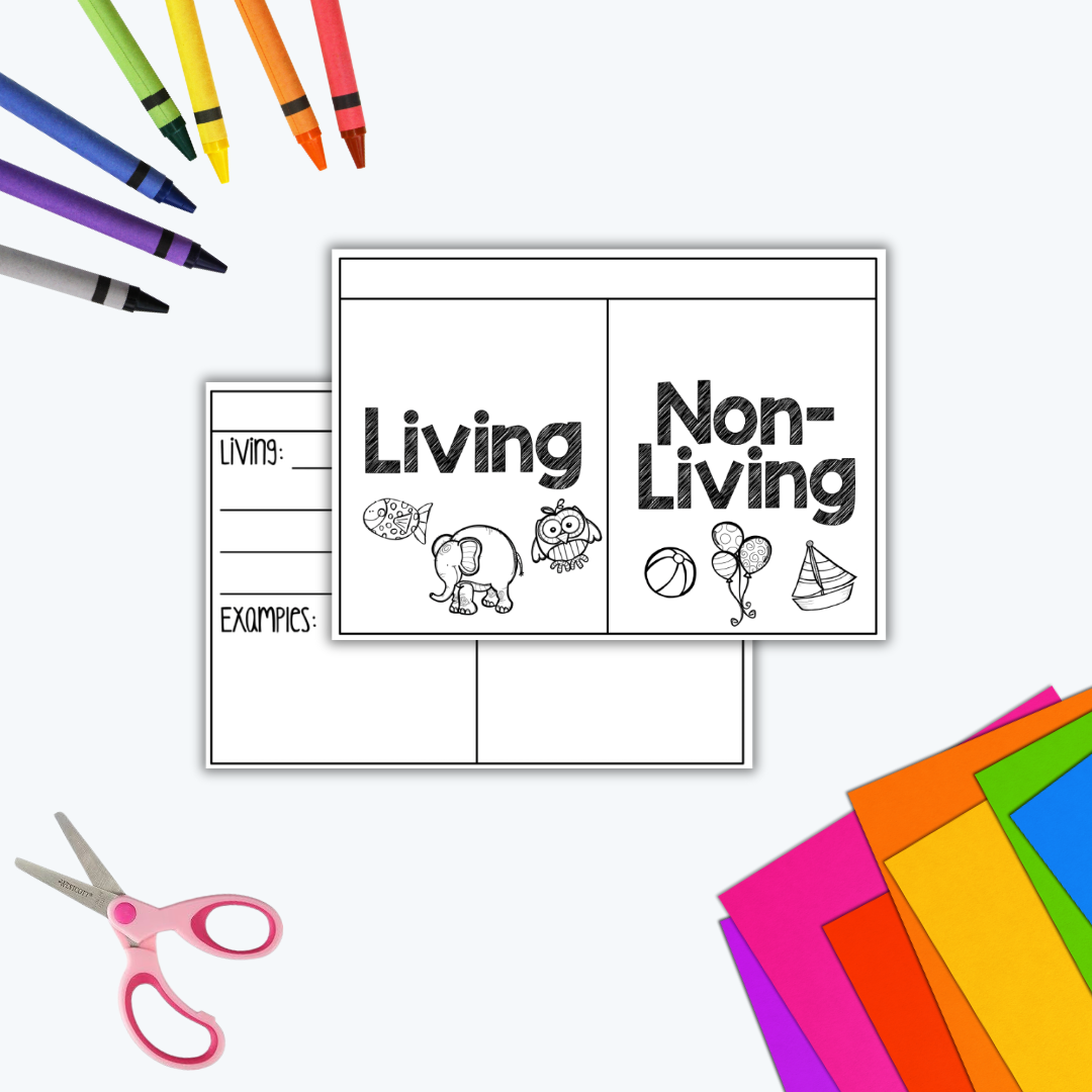 A classroom activity setup with a "Living and Non-Living" sorting worksheet, colourful cardstock, crayons, and scissors. A second worksheet with sections for listing living things and examples is partially visible underneath.