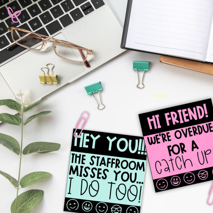 Two Teacher Wellbeing Notes cards for World Teachers' Day on a desk with paperclips, designed to brighten someone’s day.