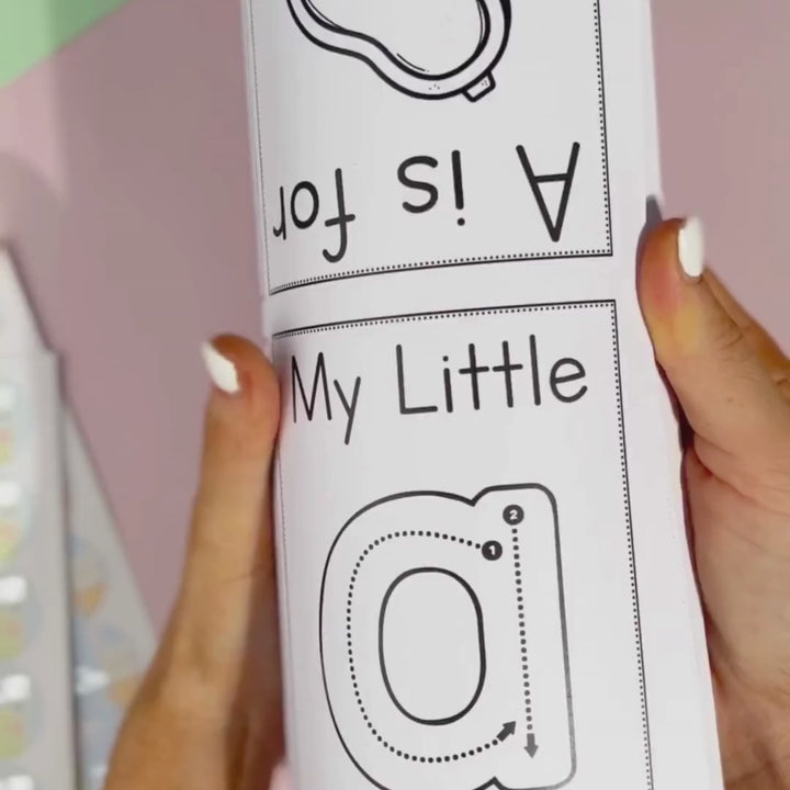 Video of a woman demonstrating how to use and fill out our Interactive Alphabet digital download Mini Books, showcasing an engaging literacy tool for early learners.